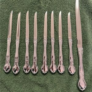 Vintage Carvel Hall stainless USA knives- set of 8 (8”) and 1 (13”)